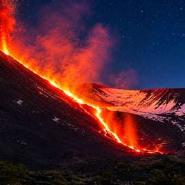 Mount Etna at sunset: pick-up from Catania, with guide, food tasting, and cave kit