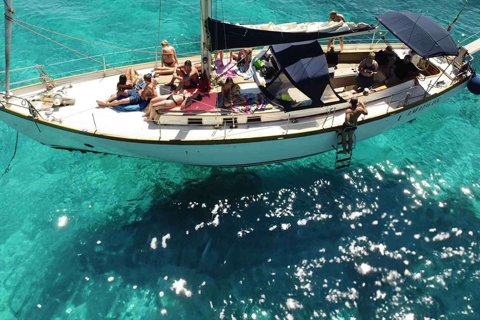 Catane : excursion en bateau avec apéritif, Prosecco et plongée en apnée
